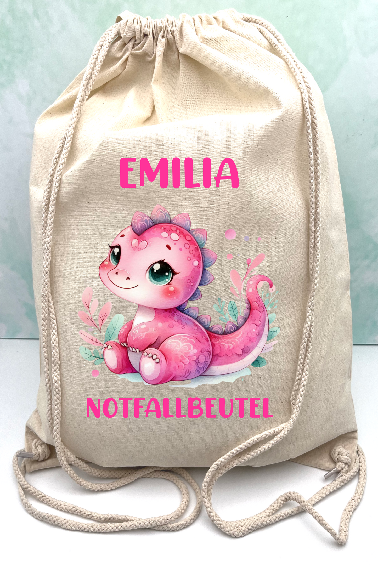Beutel für Ersatzkleidung für den Kindergarten-Personalisierte DINO ROSA Ändern Sie Schriftart und -größe.